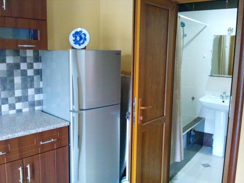 Kuchyň nebo kuchyňský kout v ubytování Apartment On Erekle 25a