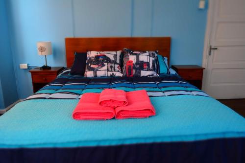 Cama o camas de una habitación en Hostal Viajeros