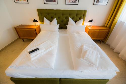 Postel nebo postele na pokoji v ubytování Hotel Luis Stadl