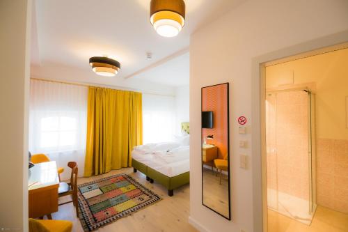 Postel nebo postele na pokoji v ubytování Hotel Luis Stadl