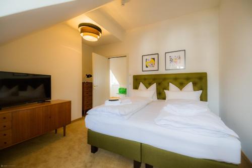 Postel nebo postele na pokoji v ubytování Hotel Luis Stadl
