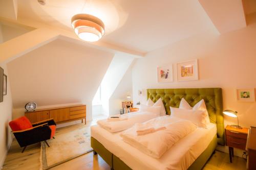 Postel nebo postele na pokoji v ubytování Hotel Luis Stadl