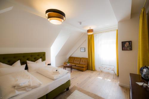 Postel nebo postele na pokoji v ubytování Hotel Luis Stadl