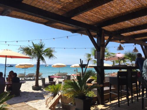 a view of the beach from the restaurant at Villa cote plage in Ajaccio