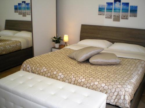 Posteľ alebo postele v izbe v ubytovaní Itaca B&B