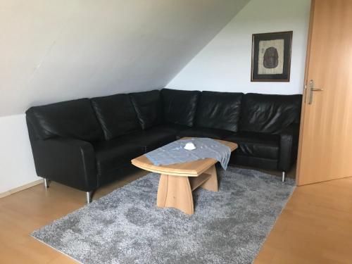 Ein Sitzbereich in der Unterkunft Ferienwohnung am Komisenpad