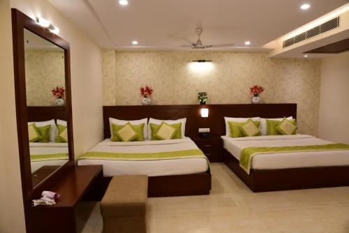 Hotel Varanasi Innにあるベッド