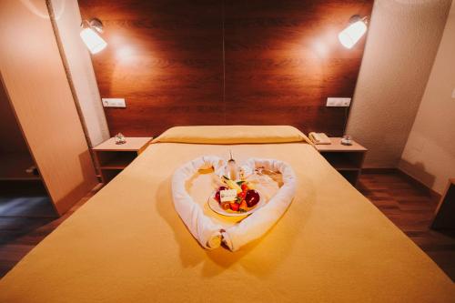 Letto o letti in una camera di Hotel Embajador