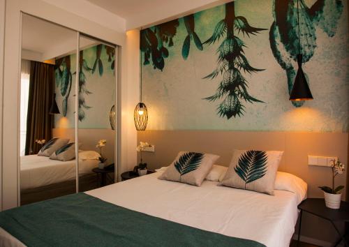 Postel nebo postele na pokoji v ubytování Hotel Torá