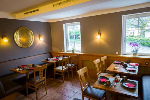 Un restaurante o sitio para comer en Hotel Residenz23