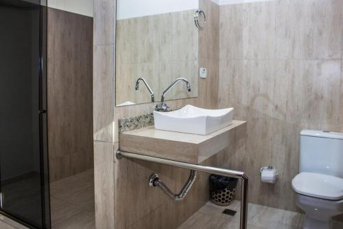 Koupelna v ubytování Hotel Paradizzo