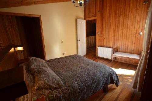 Cama o camas de una habitación en Cabañas Las Cabras