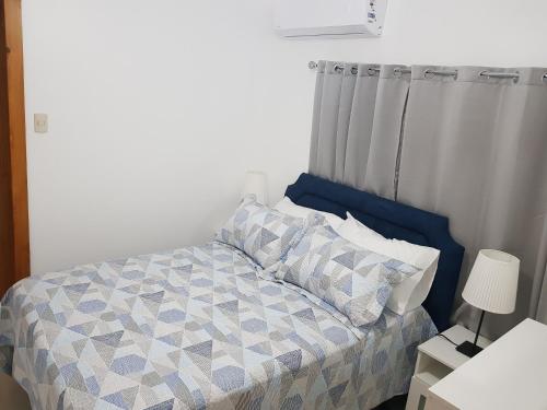 Ένα ή περισσότερα κρεβάτια σε δωμάτιο στο KSL Residence