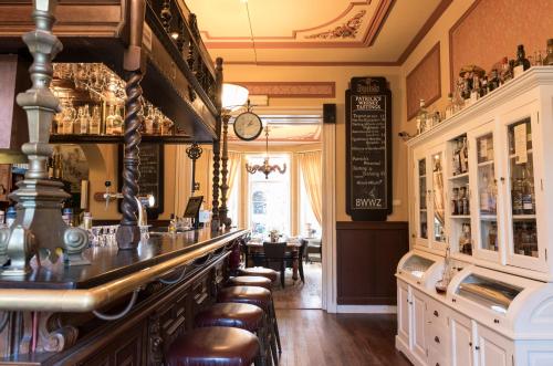 De lounge of bar bij Hotel Fidder - Patrick's Whisky Bar