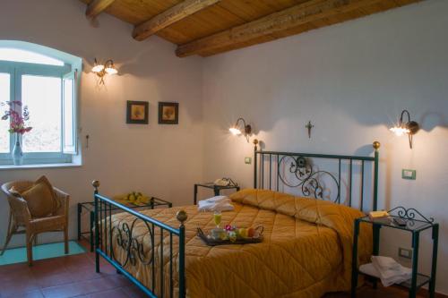 Giường trong phòng chung tại Agriturismo Villa Gaia