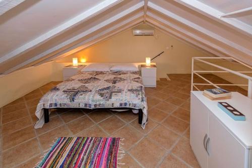 מיטה או מיטות בחדר ב-Stone House and Cottage Clio