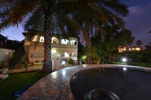 Πισίνα στο ή κοντά στο One World Village Guesthouse