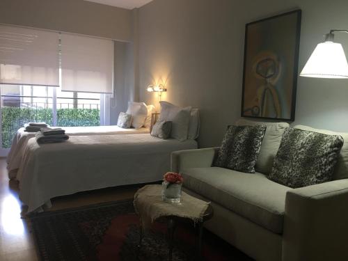 Llit o llits en una habitació de Studio Juncal