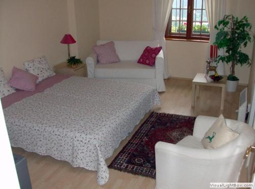 Voodi või voodid majutusasutuse Villa Tadina Ferienwohnungen Mariazell toas