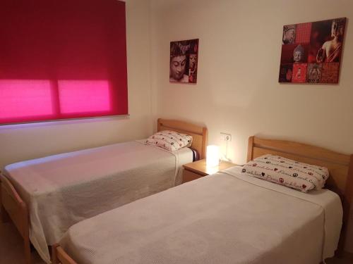 A bed or beds in a room at Como En Casa