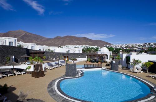 A view of the pool at Apartamentos LIVVO Coloradamar or nearby