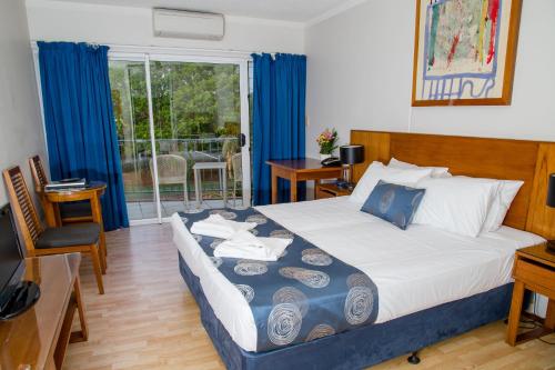 Postel nebo postele na pokoji v ubytování Cullen Bay Resorts