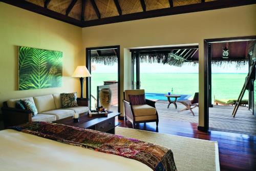 Кровать или кровати в номере Taj Exotica Resort & Spa