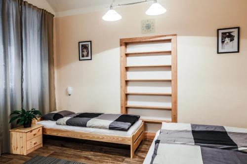 Postel nebo postele na pokoji v ubytování Accommodation Smečky 14