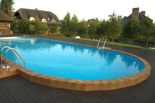Der Swimmingpool an oder in der Nähe von Pajūrio Sodyba