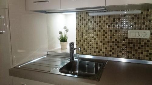 Küche/Küchenzeile in der Unterkunft Corte dei merli Apartment & Studio