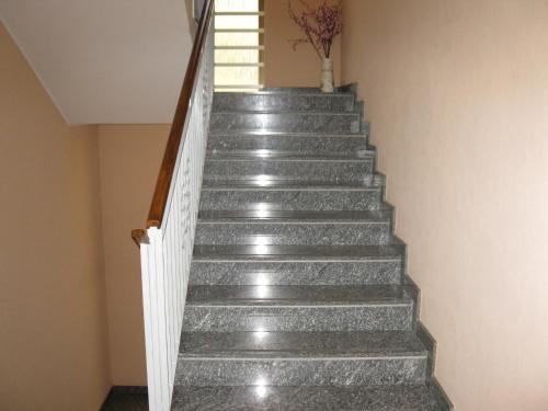 a set of stairs in a house at La Collina in Casnate con Bernate