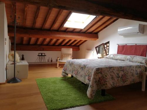 En eller flere senger på et rom på L'Aia di Maria