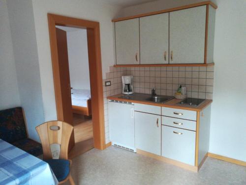 Kuchyň nebo kuchyňský kout v ubytování Bigraberhof