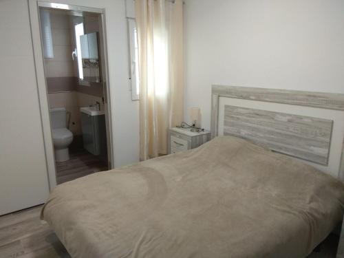 Postel nebo postele na pokoji v ubytování Apartamento Berenguer