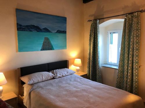 Postel nebo postele na pokoji v ubytování Theea Cottage - Wonderful Sea Views