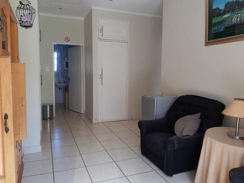 Χώρος καθιστικού στο Ezulwini Guest House