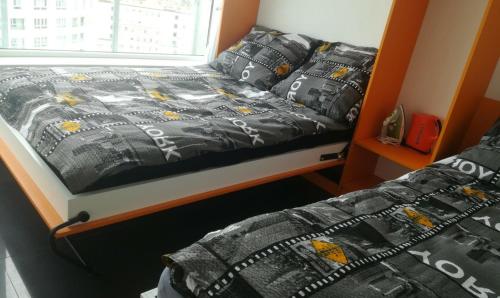 a bedroom with two beds and a window at Walk distance to mokotow business park in Warsaw