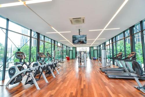 a gym with a row of treadmills and machines at The Shore Walking To Jonker Streets 5 in Melaka