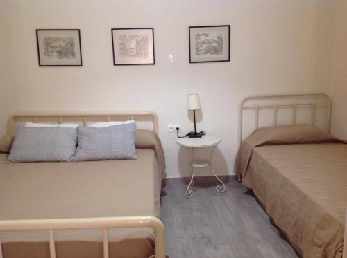 Ένα ή περισσότερα κρεβάτια σε δωμάτιο στο George Home 1