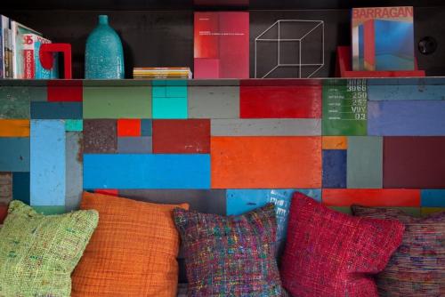 a display of colorful pillows in front of a wall at Mini Loft ULB DELTA area with terrace in Brussels