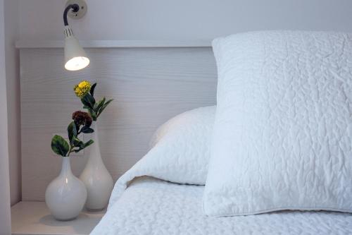 Letto o letti in una camera di Angelina Apartments Amalfi Coast