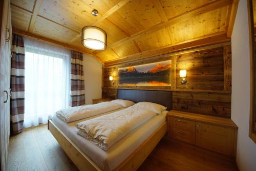 Posteľ alebo postele v izbe v ubytovaní Agriturismo Grones