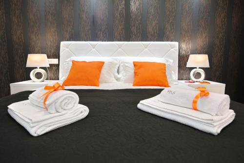 Кровать или кровати в номере Zadar Luxury Rooms