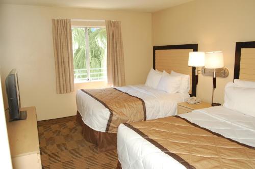 A bed or beds in a room at Extended Stay America Suites - Las Vegas - Valley View