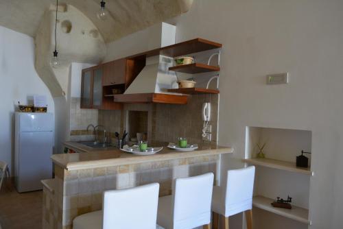 San Biagio Materapartmentにあるキッチンまたは簡易キッチン
