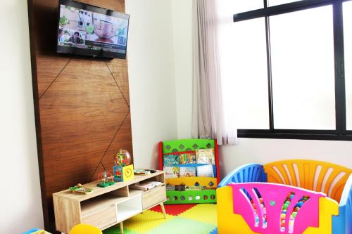 TV a/nebo společenská místnost v ubytování Weekender Resort