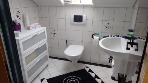 A bathroom at Ferienwohnung Munz