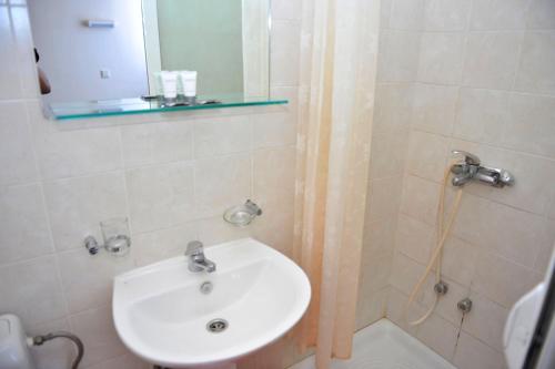 Koupelna v ubytování Hotel Vergina