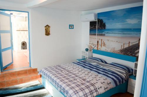 מיטה או מיטות בחדר ב-Sailors Guest House Jurilovca