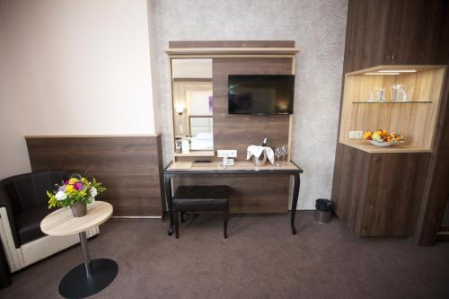 TV o dispositivi per l'intrattenimento presso Hotel ZOO Sofia - Secured Paid Parking